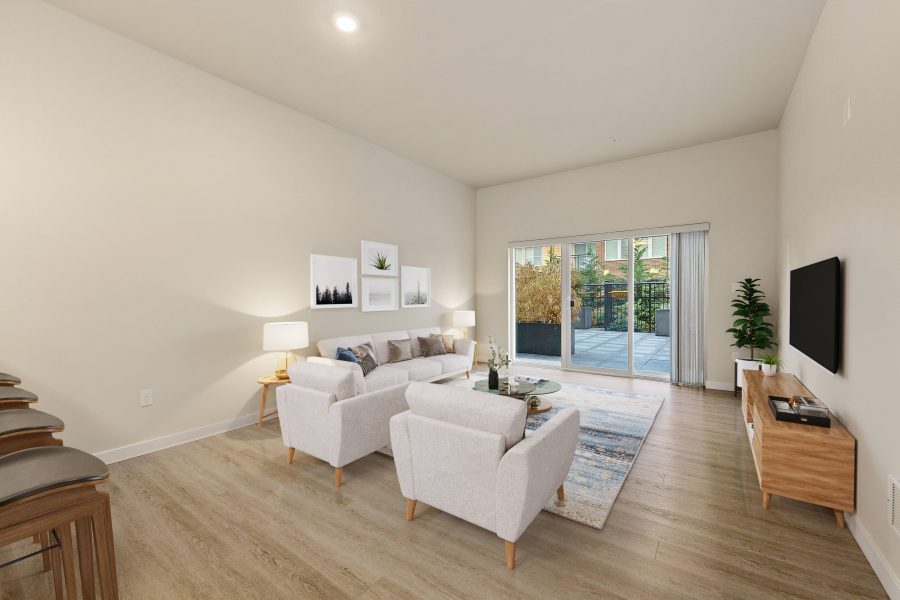 Living room with stairs and patio doors