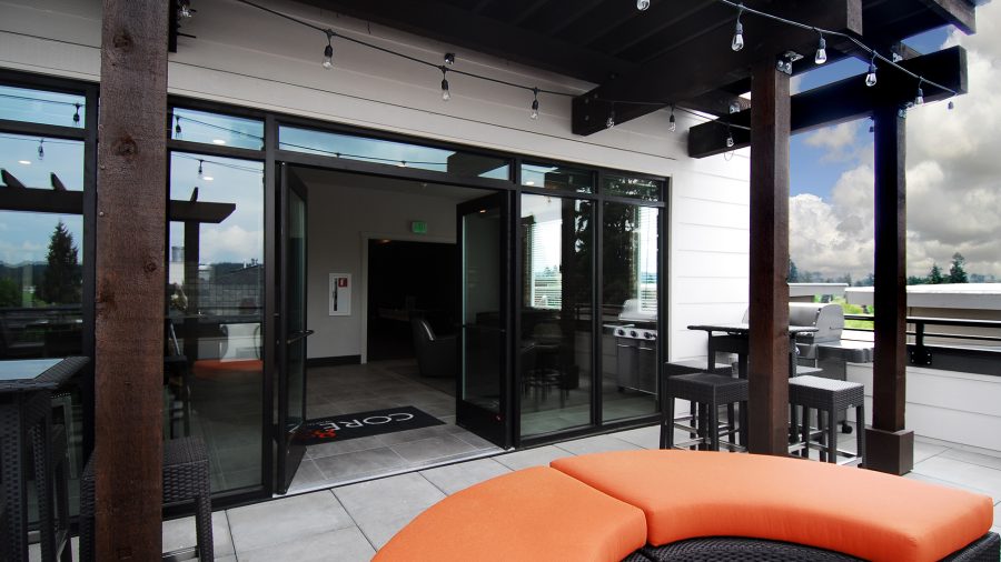 Rooftop deck lounge seating with city views